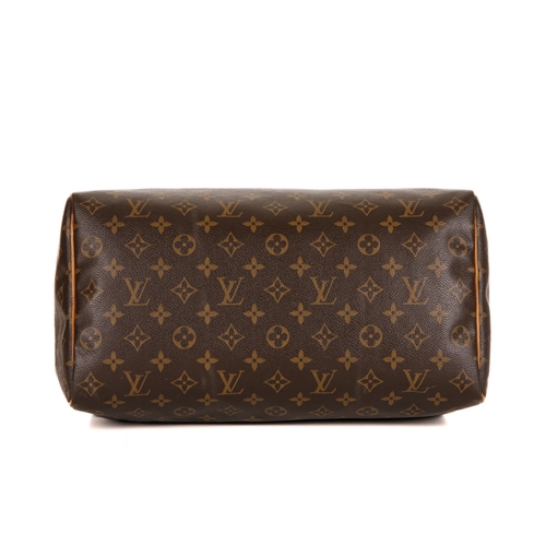 344 - Louis Vuitton, a monogram Speedy 35 handbag, featuring the maker's monogram coated canvas exterior w... 