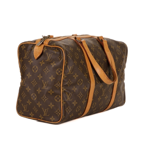 346 - Louis Vuitton, a Sac Souple 35 handbag, featuring the maker's monogram coated canvas exterior with n... 