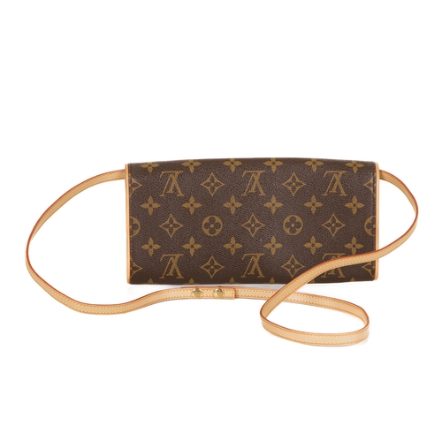 348 - Louis Vuitton, a monogram Pochette Twin GM handbag, designed with a monogram coated canvas exterior,... 