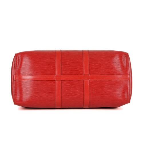 356 - Louis Vuitton, a red epi Keepall 45 luggage bag, featuring a red textured leather exterior and smoot... 