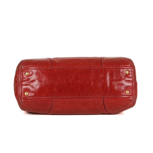 384 - Prada, a red Vitello Shine handbag, featuring a glossy red leather exterior, with gold-tone hardware... 