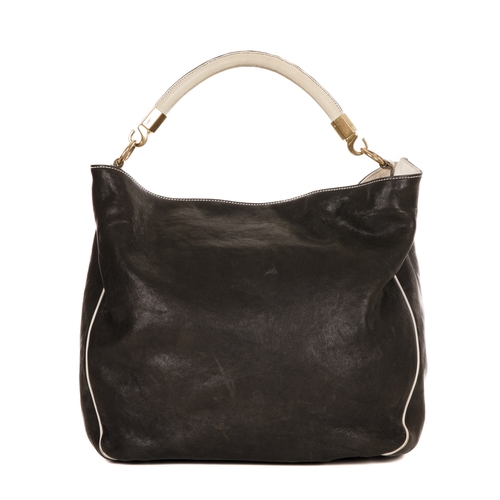 409 - Yves Saint Laurent, a large Roady hobo handbag, crafted from black leather with contrasting white le... 