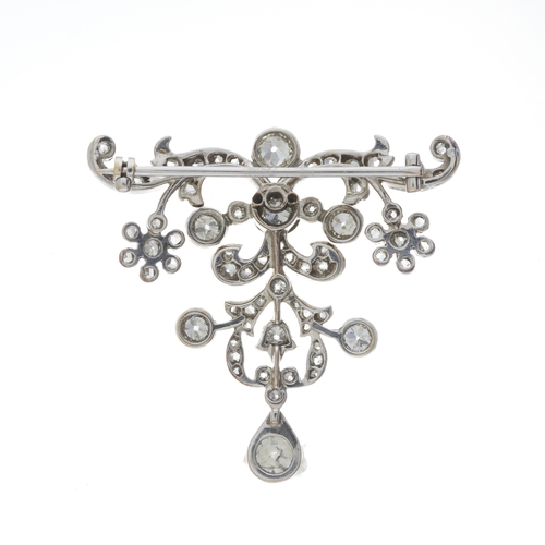 42 - A Belle Epoque gold and silver old-cut diamond floral brooch, principal old-cut diamond estimated we... 