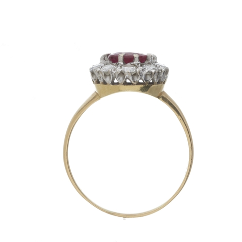 43 - An 18ct gold ruby and brilliant-cut diamond cluster ring, ruby estimated weight 1.60ct, estimated to... 