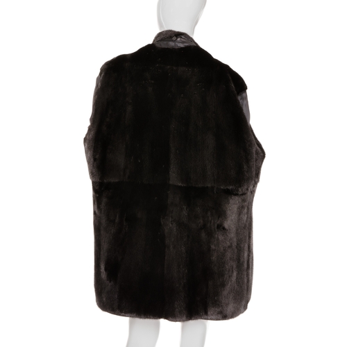 439 - A men's black leather jacket with mink fur trim, the soft nappa leather jacket, featuring two exteri... 