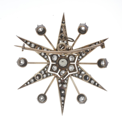 44 - A late Victorian silver and gold old-cut diamond star pendant, principal diamond estimated weight 0.... 