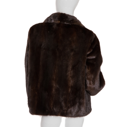 450 - A dark ranch mink jacket, featuring a short lapel collar, hook and eye clip fastenings and two outer... 