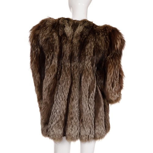 451 - A collarless silver fox fur coat, designed with an open front and two exterior pockets, chest measur... 