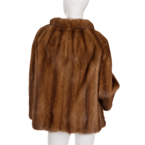 454 - A mink jacket and fox fur stole, the demi buff mink jacket, featuring a short lapel collar, single h... 