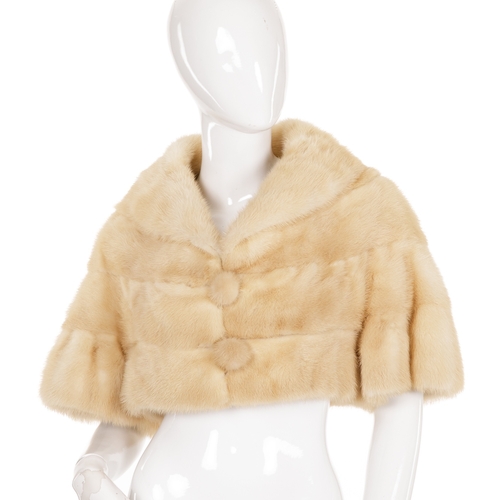 457 - A fur cape and bolero, to include a fox fur cape, with hook and eye clip fastenings, together with a... 