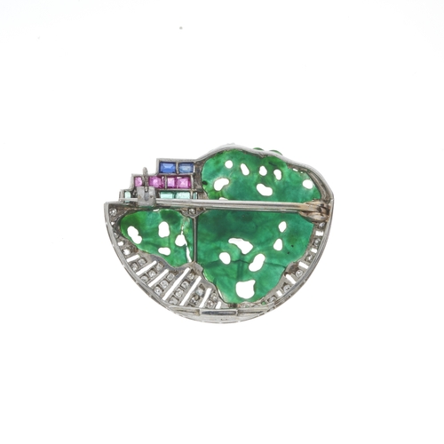 52 - An Art Deco white metal carved jade, single-cut diamond, calibre-cut ruby, sapphire and emerald broo... 