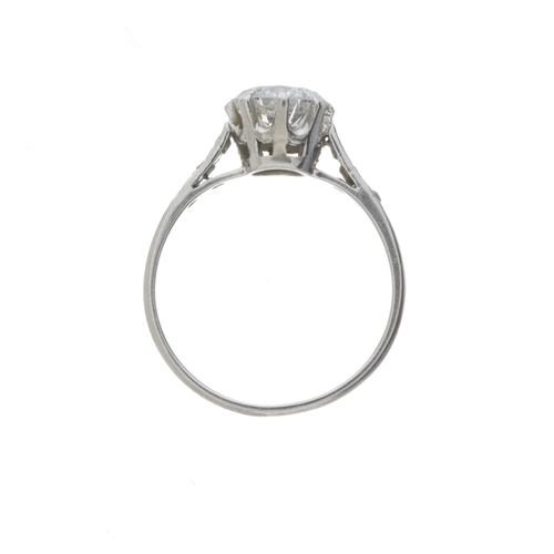 60 - A mid 20th century platinum circular-shape diamond single-stone ring, with old-cut diamond line shou... 