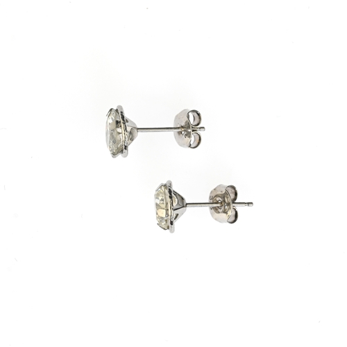 61 - A pair of 9ct gold diamond single-stone stud earrings, estimated total diamond weight 2ct, H-J colou... 