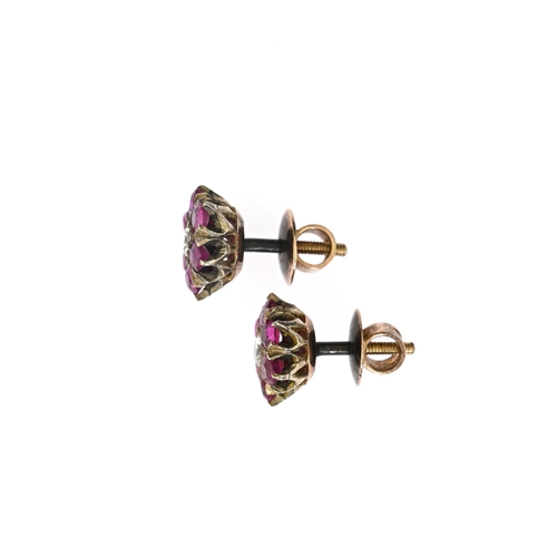 66 - A pair of early 20th century gold ruby and brilliant-cut diamond cluster stud earrings, estimated to... 