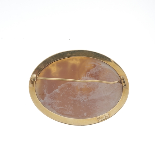 73 - An 18ct gold shell cameo brooch, depicting a classical scene, stamped 750, length 4.3cm, 8.2g