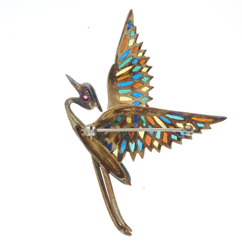 78 - A 14ct gold green enamel and diamond bird brooch, designed as a crane in flight with plique-a-jour e... 