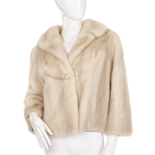 449 - An azurene mink jacket, designed with a notched lapel collar, cropped sleeves, a single hook and eye... 