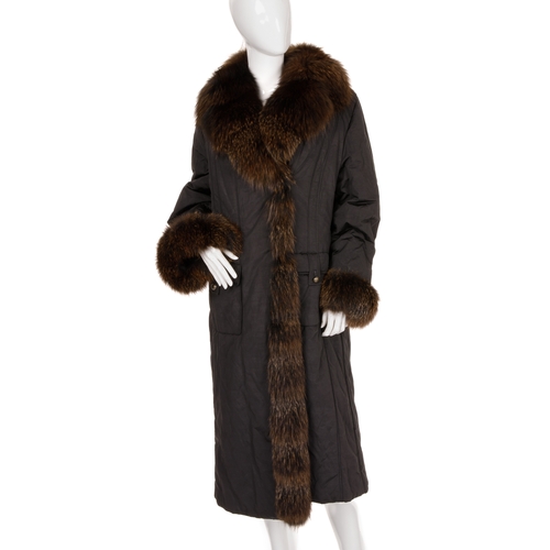 445 - A full-length black coat with fox fur trim, featuring a black polyester/cotton shell, with brushed g... 