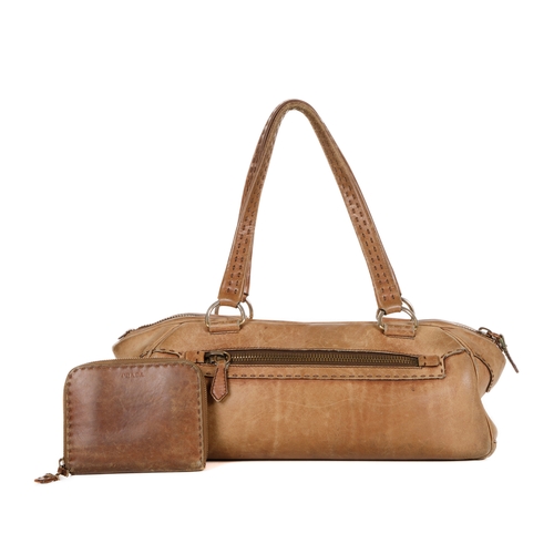 389 - Prada, a leather handbag and matching purse, crafted from smooth beige leather, with two exterior zi... 