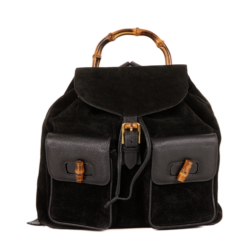 297 - Gucci, a large Bamboo backpack, designed with a black suede exterior with grained leather trim, feat... 