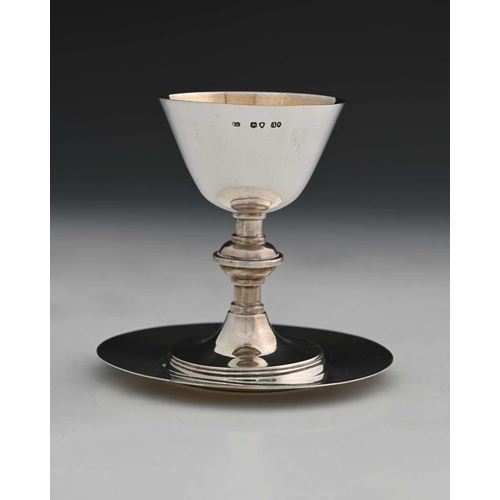 111 - A Victorian silver chalice and paten, parcel gilt, chalice 9.5cm high (2)