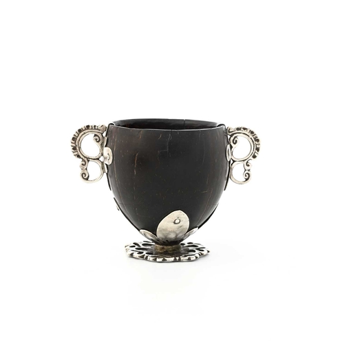 113 - An 18th century Spanish Colonial 'coco chocolatero' white metal mounted chocolate cup, the coconut b... 