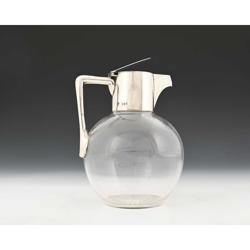 119 - Christopher Dresser for Heath and Middleton, a silver mounted glass claret jug, London 1890, the sph... 