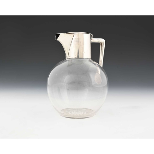 119 - Christopher Dresser for Heath and Middleton, a silver mounted glass claret jug, London 1890, the sph... 