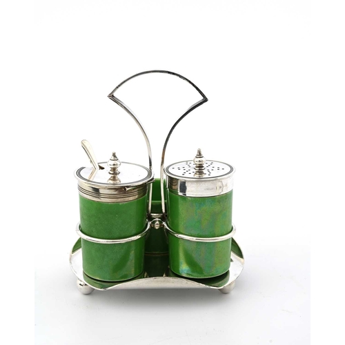 124 - George Unite for Ruskin Pottery, an Arts and Crafts silver plated green lustre cruet set, 1911, the ... 