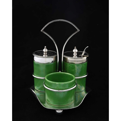 124 - George Unite for Ruskin Pottery, an Arts and Crafts silver plated green lustre cruet set, 1911, the ... 