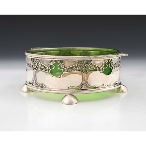 128a - Kate Harris for Goldsmiths and Silversmiths Company, an Arts and Crafts silver and glass bowl, cylin... 