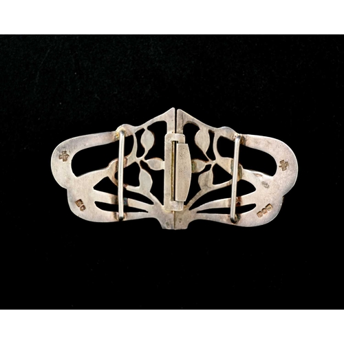 129 - Kate Harris for G L Connell, an Arts and Crafts silver and gem set buckle, London 1902, cast with si... 