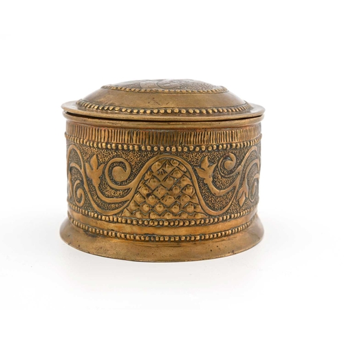 164 - Keswick School of Industrial Arts, an Arts and Crafts repousse brass box, cylindrical form, decorate... 