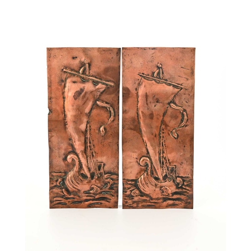 168 - A pair of Arts and Crafts repousse copper plaques or door plates, in the Newlyn style, decorated wit... 