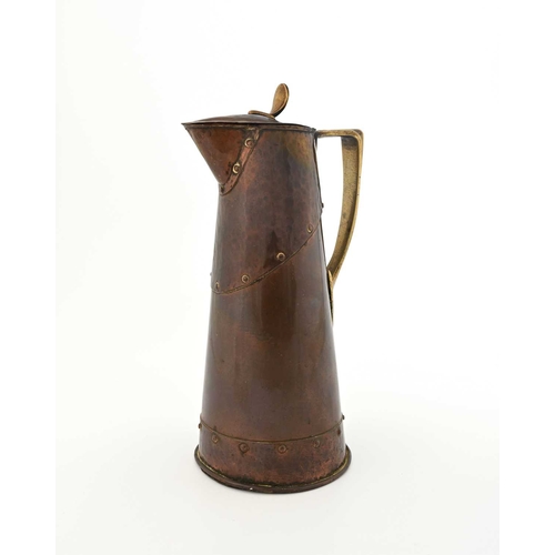 171 - An Arts and Crafts copper and brass jug, William Soutter and Sons, conical form with planished rivet... 