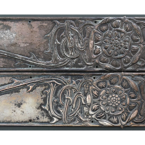 178 - A pair of Arts and Crafts embossed silver plated door plates, each with a Tudor rose on knotted and ... 