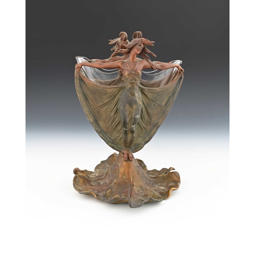 183a - An Art Nouveau patinated art metal and glass vase, modelled as a maiden with outstretched arms