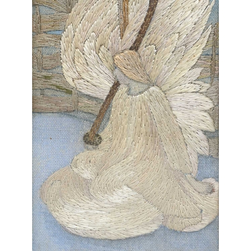 188 - An Arts and Crafts embroidered silk panel in the PreRaphaelite style of a kneeling angel beside a fr... 