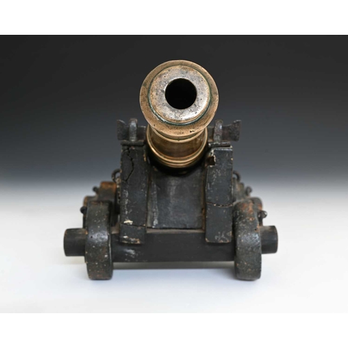 207 - A George III bronze 8 bore signal cannon in wooden stand, early 19th century, Blomfield Pattern type... 