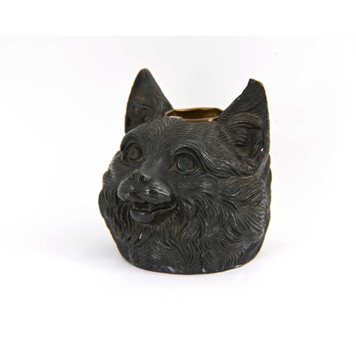 210 - A novelty patinated metal inkwell cast in the form of a cat's head, 7.5cm high