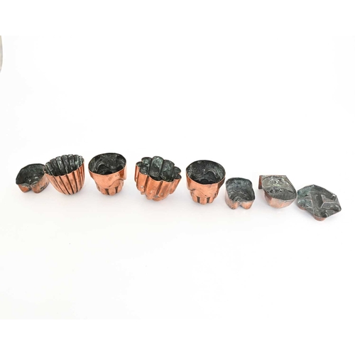 215 - Eight Victorian miniature copper jelly moulds, a pair of circular fluted flat-top designs, one a flu... 