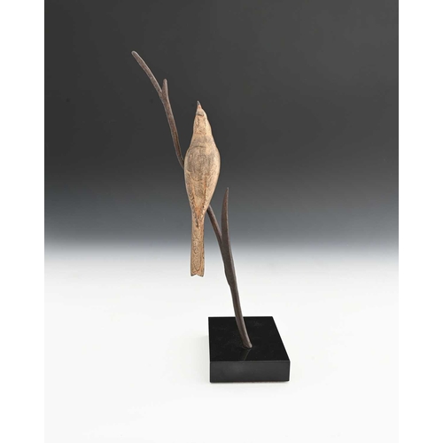 222 - Andre Vincent Becquerel (French, 1893-1981), a bird on a branch, signed, gilt bronze, mounted on a b... 