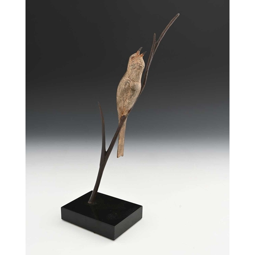 222 - Andre Vincent Becquerel (French, 1893-1981), a bird on a branch, signed, gilt bronze, mounted on a b... 