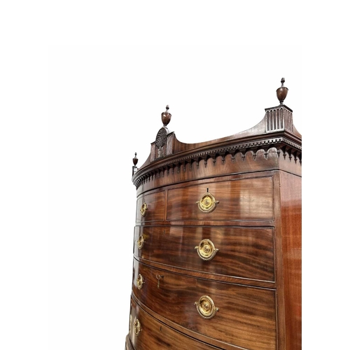 232 - A George III flame mahogany bow-fronted chest on chest, circa 1810, pediment top with urn finials, t... 