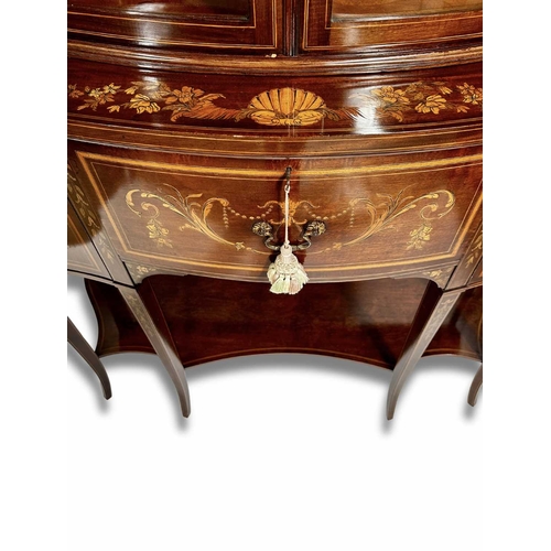 233 - An Edwardian mahogany bow-fronted vitrine, circa 1910, crossbanded, strung and marquetry inlaid thro... 