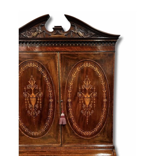 235 - An Edwardian mahogany cylinder bureau bookcase, circa 1910, crossbanded and strung throughout, broke... 