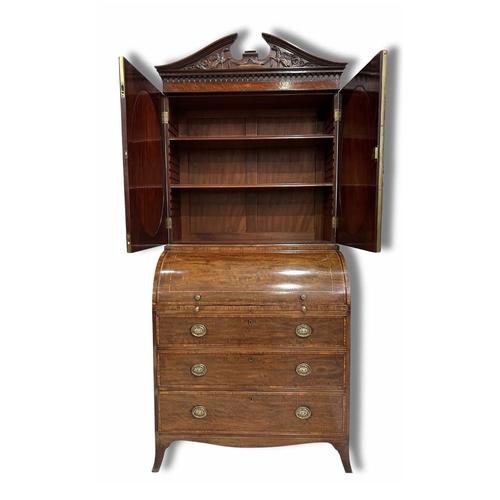 235 - An Edwardian mahogany cylinder bureau bookcase, circa 1910, crossbanded and strung throughout, broke... 