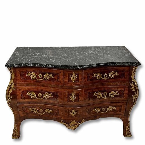 238 - A Louis XV kingwood commode, of bombe form, serpentine black and white veined marble top with moulde... 