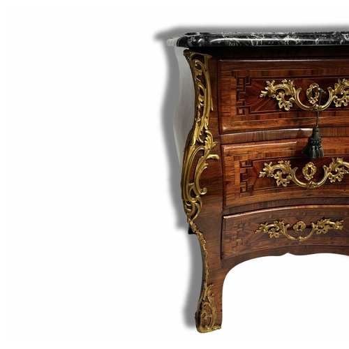 238 - A Louis XV kingwood commode, of bombe form, serpentine black and white veined marble top with moulde... 