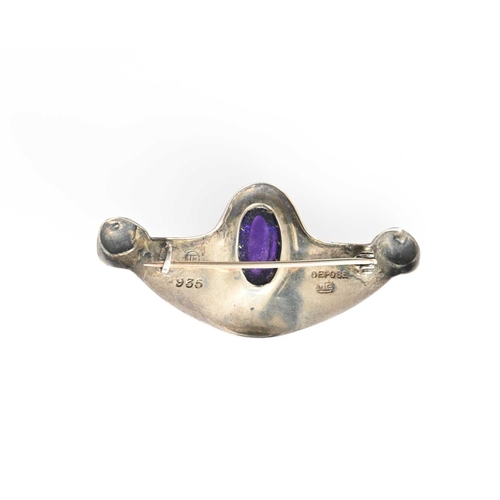 27 - Max Gradl for Theodor Fahner, a Jugendstil silver and amethyst brooch, winged form with central oval... 